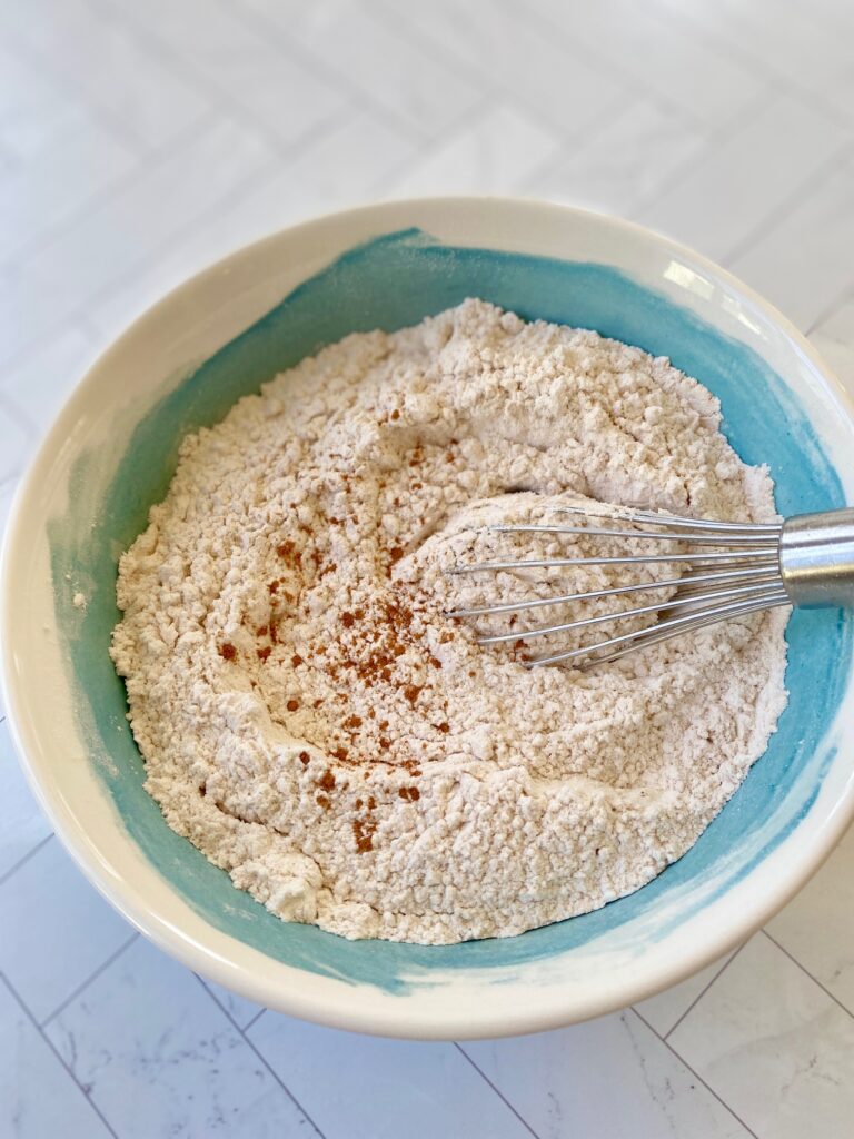 flour mixture with cinnamon in blue bowl