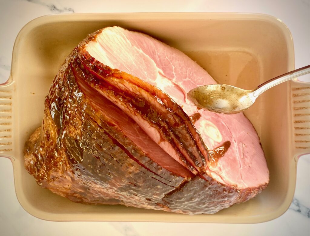 glzing a ham in a baking dish