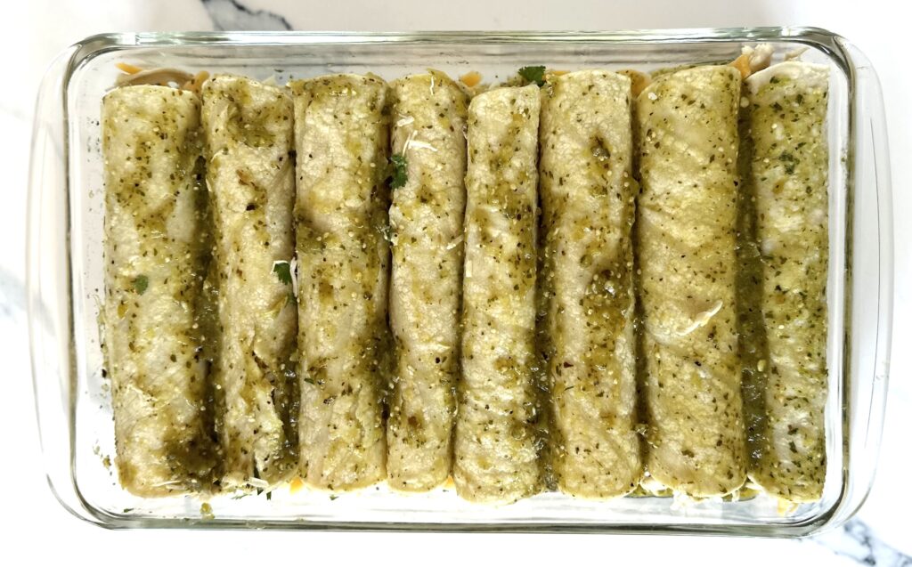 A pan of uncooked Green Enchiladas