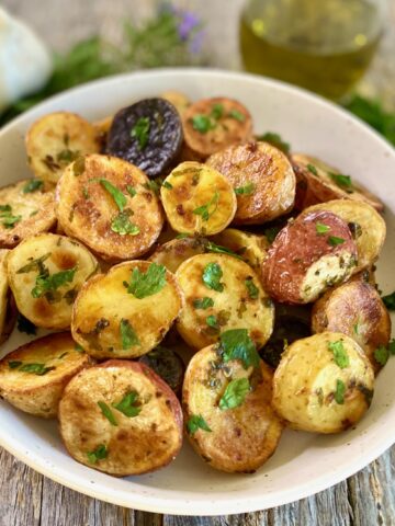 bowl of potatoes with herbs