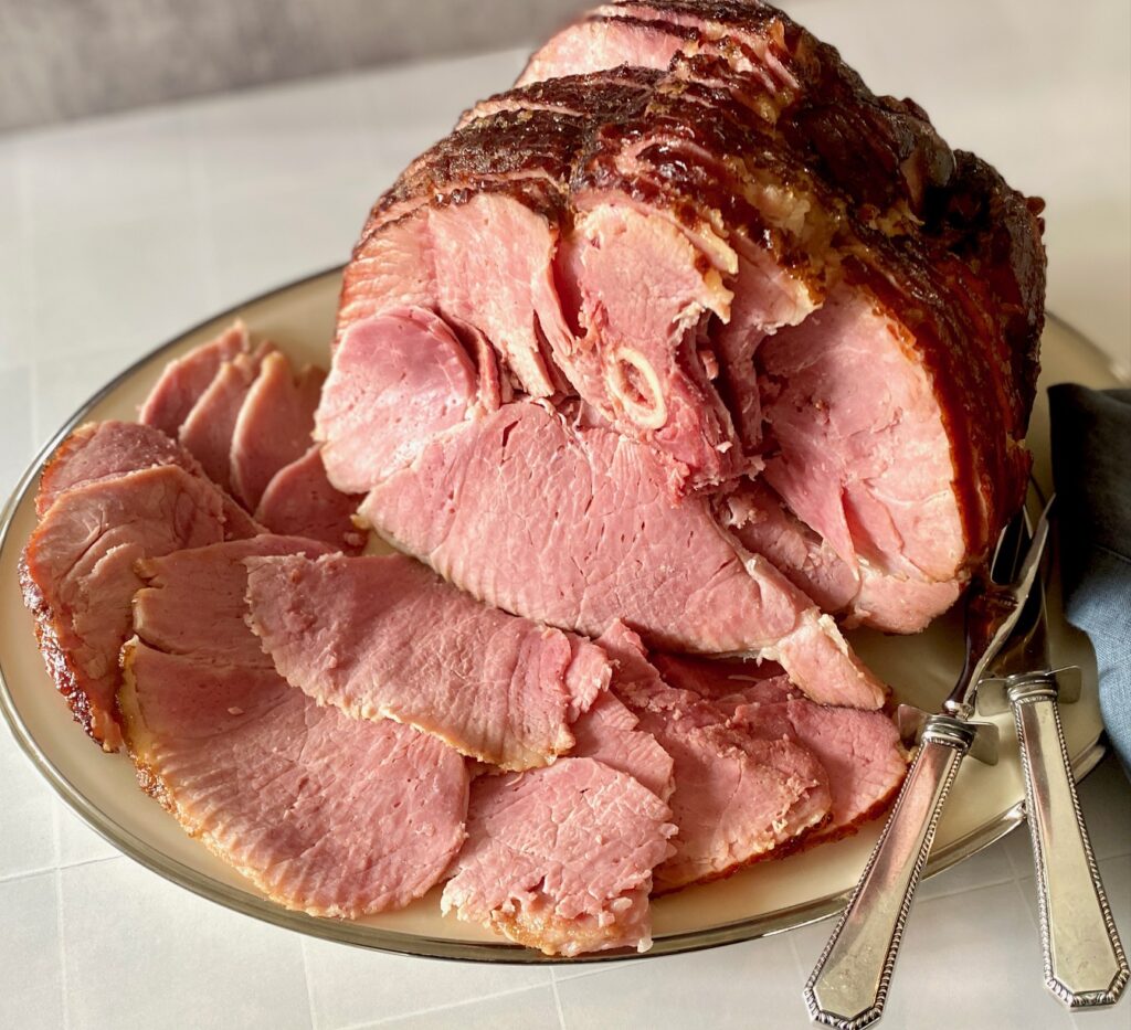 Honey glazed ham on a platter