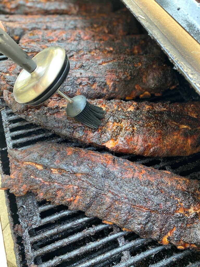mopping a rack of ribs