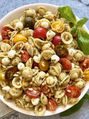 A bowl of pesto pasta salad
