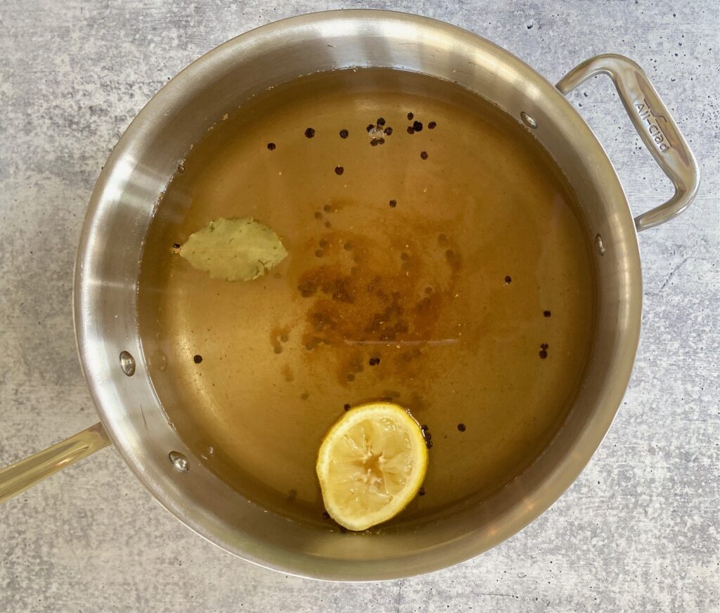 a pan of poaching liquid