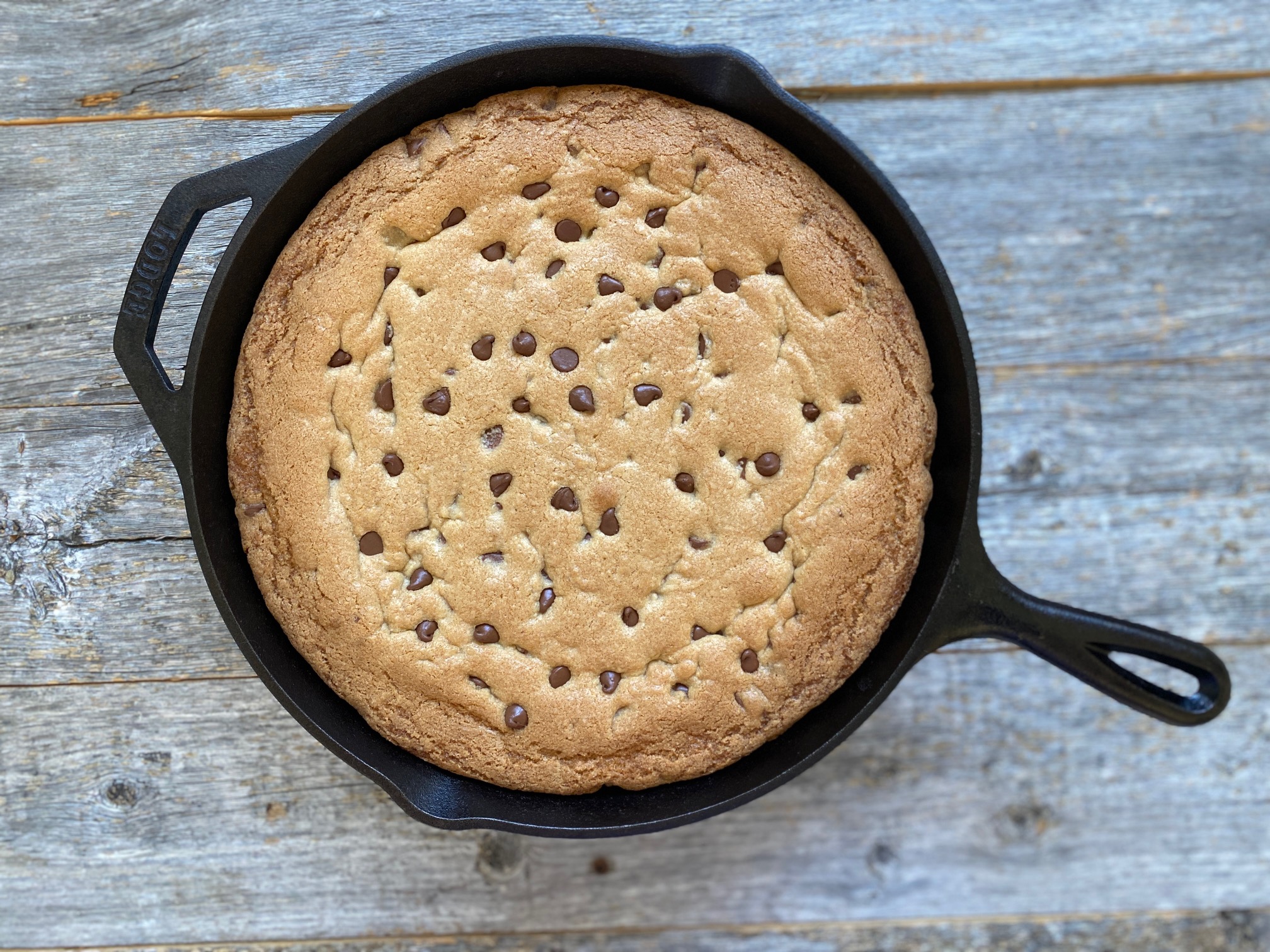 chocolate chip cookie in a cast iron skillet