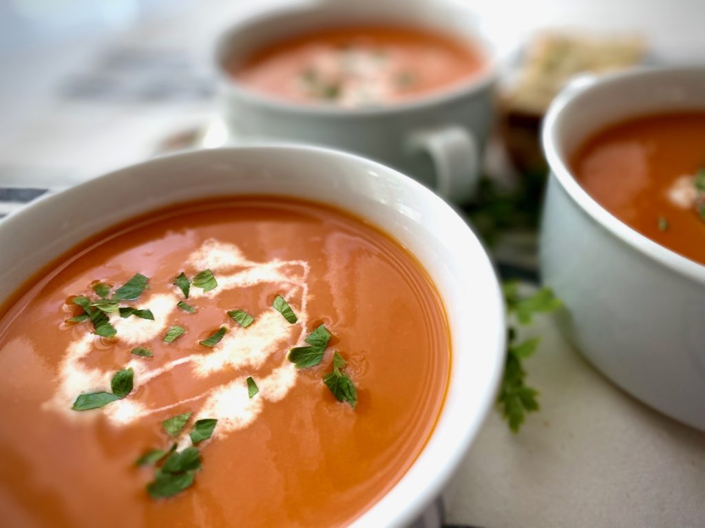Roasted Tomato Soup in white bowls